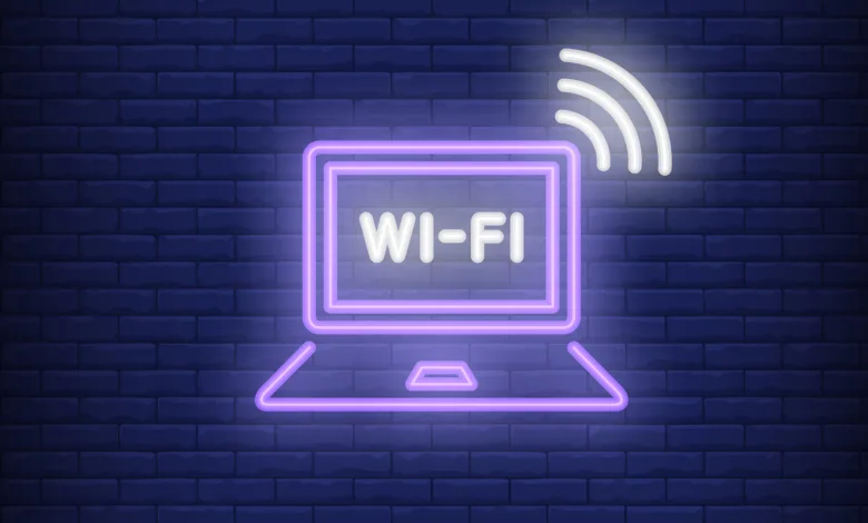 Laptop computer and wi-fi neon text. Wifi, communication, technology concept. Advertisement design. Night bright neon sign, colorful billboard, light banner. Vector illustration in neon style.